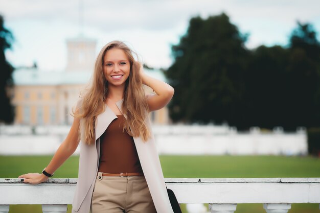 Beautiful blonde woman in the park