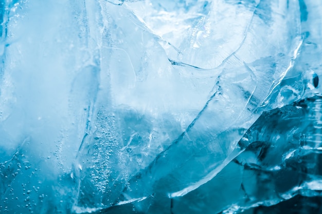 Beautiful blue cracked ice. texture of frozen water.