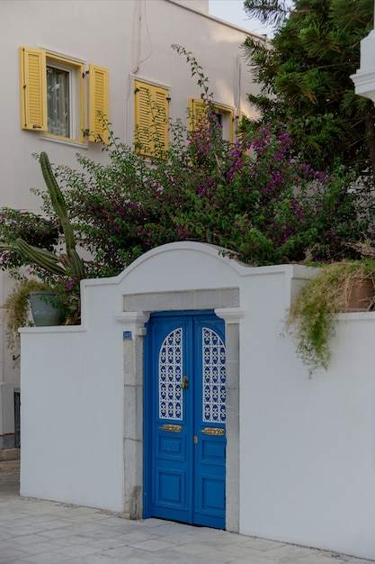 Beautiful blue door in a white wall in the style of european resorts bodurm turkey