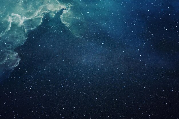 Beautiful blue night starry sky Deep space with clouds and stars