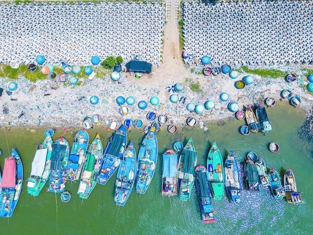 Beautiful blue skyline panoramic in Loc An Canal Scenery landscape of fishing port with tsunami protection concrete blocks Cityscape and boats in the sea Loc An village near Vung Tau City