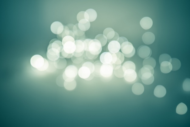 Beautiful blurred bokeh, a lot of bright artistically blurred circles. Christmas background. 