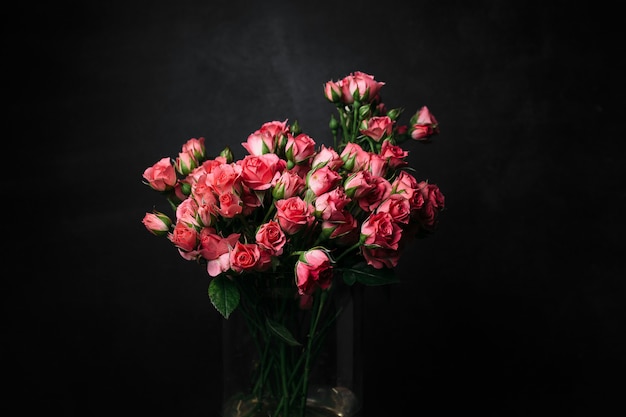 Beautiful bouquet of flowers on black background