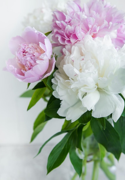 Beautiful bouquet of flowers white and pink peoniesxA