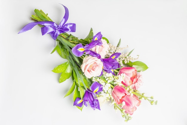 A beautiful bouquet of fresh flowers isolated on white surface