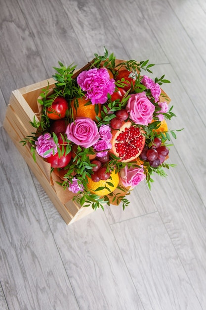 Beautiful bouquet of fruits and flowers