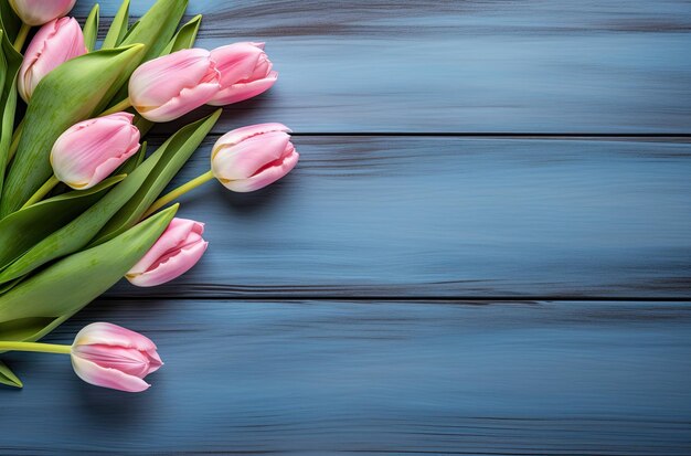 Beautiful Bouquet of Pink Tulips on Blue Wooden Background