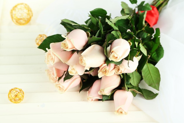 Beautiful bouquet of roses, on light background