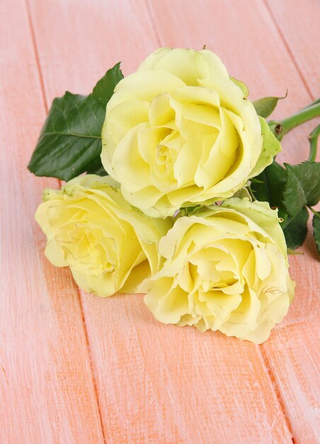 Beautiful bouquet of roses on table close-up