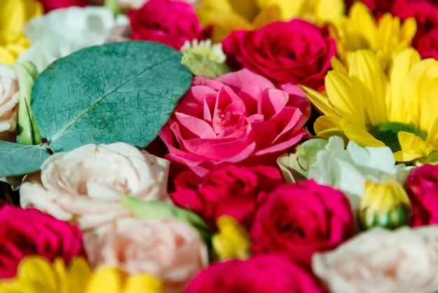 Beautiful bouquet of roses and wildflowers