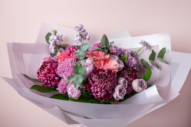 Beautiful bouquet with chrysanthemums roses gerbera daisies Color of the year 2022 Veri peri