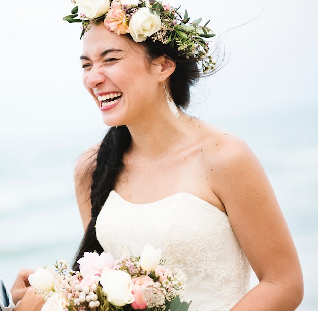 Beautiful bride by the sea