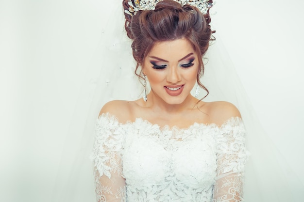 Beautiful bride on a white background