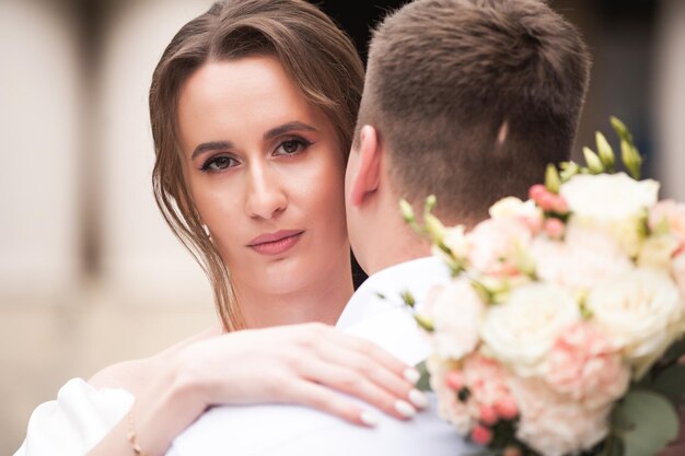 Beautiful bride with wedding bouquet