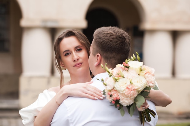 Beautiful bride with wedding bouquet