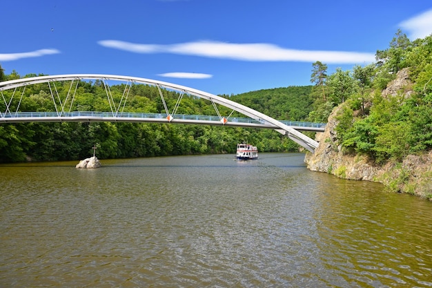 Beautiful bridge over the water Brno Dam Beautiful summer landscape in the Czech Republic