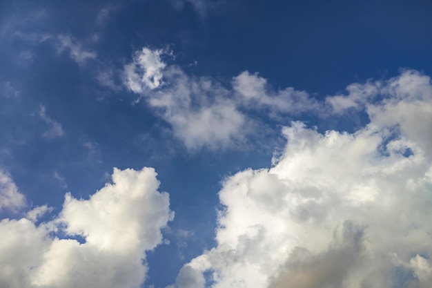 Beautiful bright blue sky and clouds background