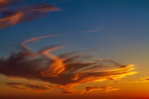 Beautiful bright sky with clouds at sunset