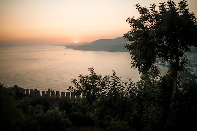 A beautiful bright sunset against the backdrop of the endless Mediterranean Sea Sea sunset view