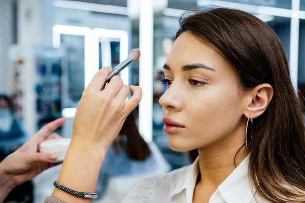 Beautiful brunette woman in a beauty salon