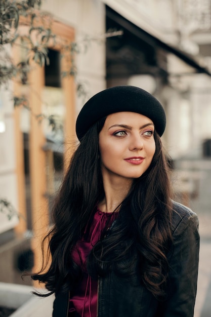 Beautiful brunette woman dressed in retro style