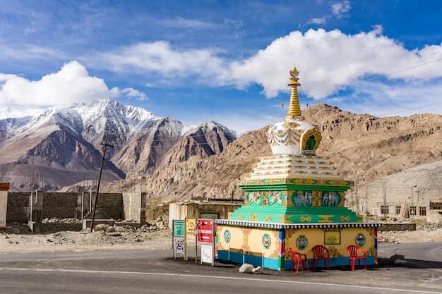 Beautiful buddhist stupa with blue sky cloudy near Pangong Lake in Leh, Ladakh