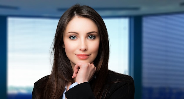 Beautiful business woman portrait in her office