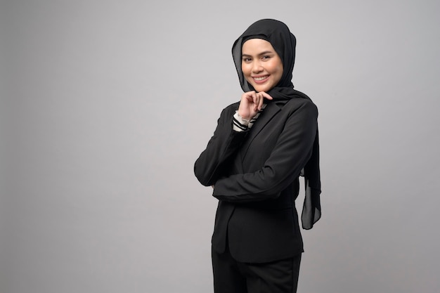 A beautiful business woman with hijab portrait on white background