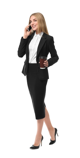 Beautiful businesswoman speaking by mobile phone on white