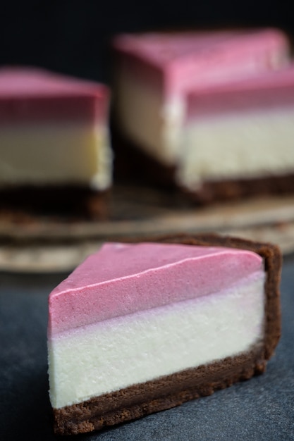  beautiful cake with milk souffle against a dark background