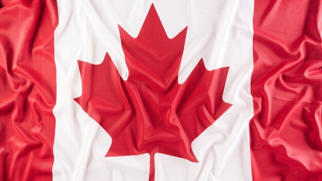 A beautiful Canada national flag cloth fabric a sign or symbol of Canada day concept