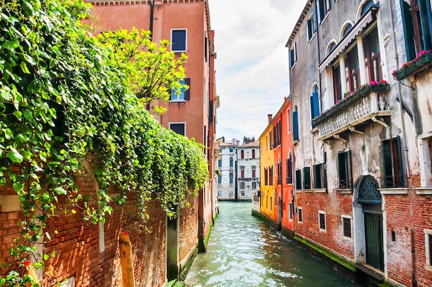 Beautiful canal with colorful buildings in Venice, Italy