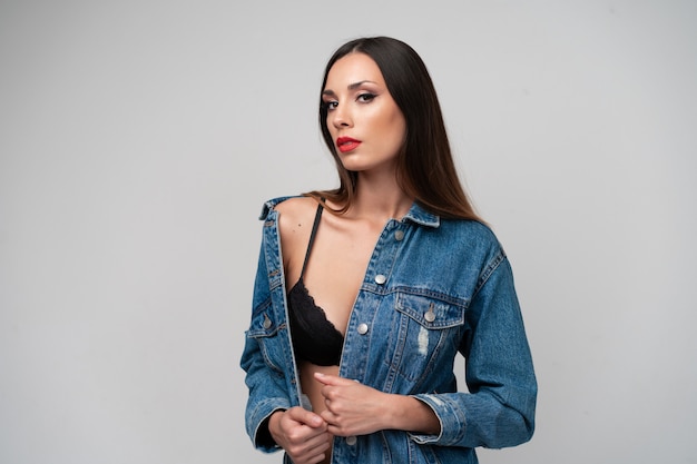 Beautiful caucasian girl denim jacket posing  