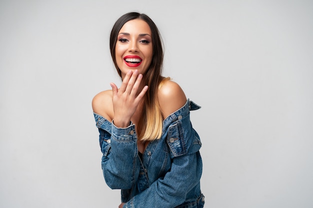 Beautiful caucasian girl denim jacket posing  