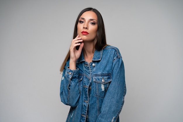 Beautiful caucasian girl denim jacket posing  