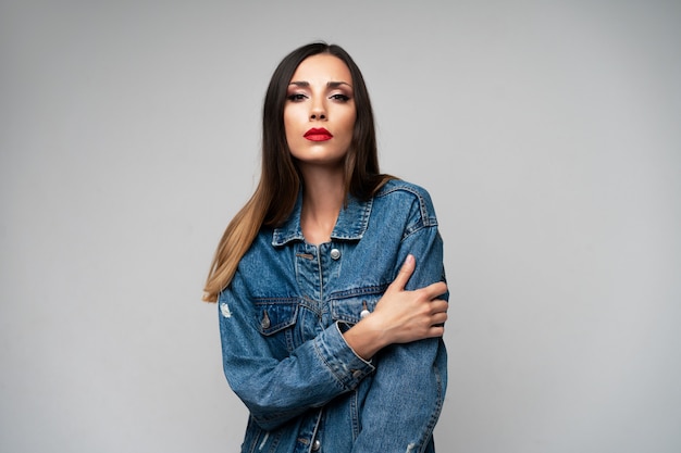 Beautiful caucasian girl denim jacket posing  