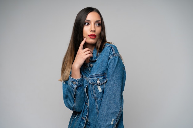 Beautiful caucasian girl denim jacket posing  