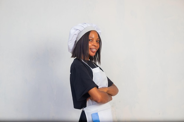 Beautiful chef smiling isolated over white background