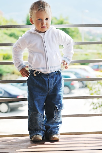 beautiful children  posing in fashionable clothing outdoor