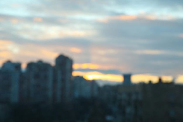 Beautiful city sunset with clouds selective focus