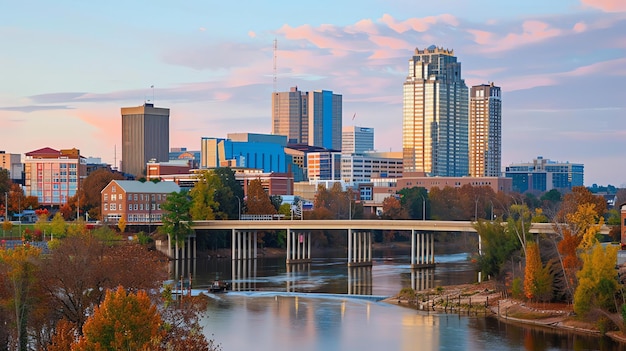 Photo a beautiful cityscape image of a downtown area with a river in the foreground and a bridge spanning the river