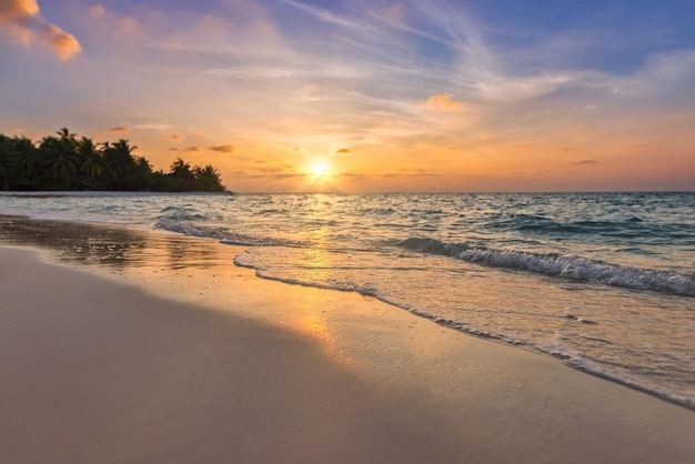 Beautiful closeup calm sea water waves dream sunrise sunset. Tropical island beach landscape, exotic