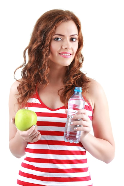 Beautiful closeup portrait of young woman with a green apple an