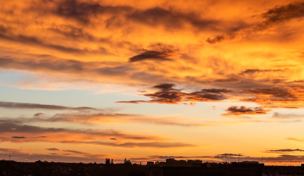 Beautiful cloudy sunset Colorful sky over horizon