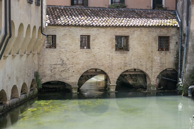 Beautiful coastline buildings in Buranelli canal Treviso, Italy