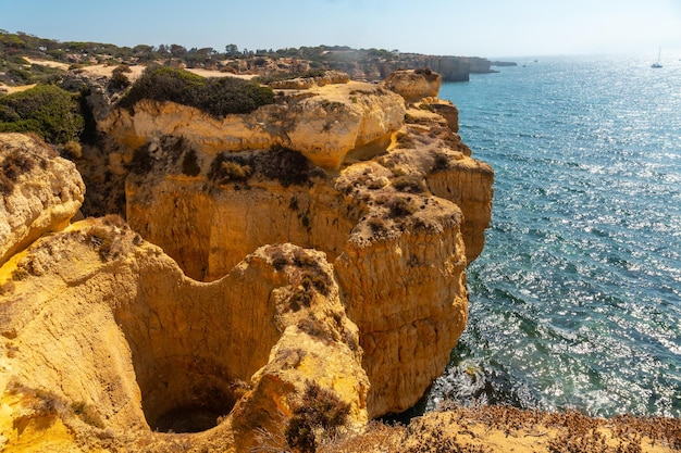 Beautiful coastline in summer at Praia da Coelha Algarve Albufeira Portugal