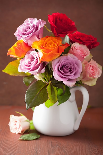 Beautiful colorful rose flowers bouquet in vase