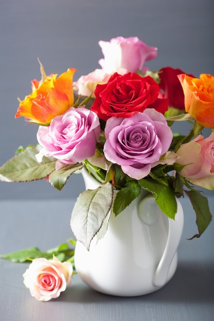 Beautiful colorful rose flowers bouquet in vase