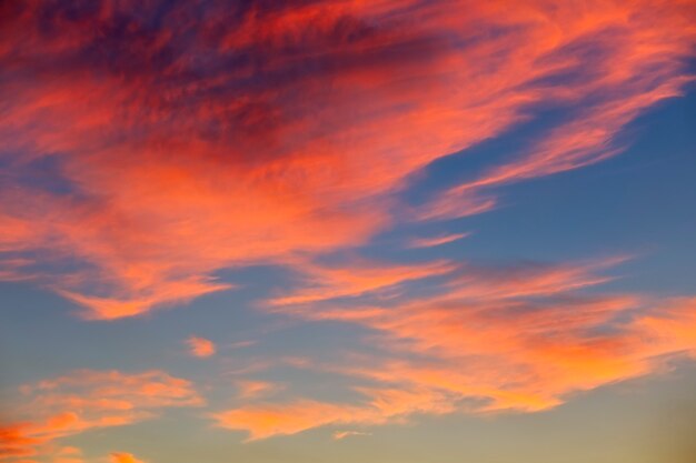 Beautiful colorful sky. Fiery orange sunset sky.