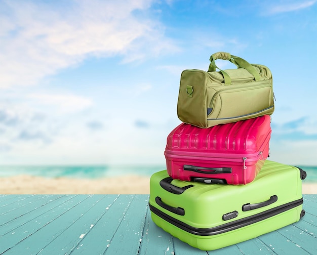 Beautiful Colorful suitcases on wooden floor